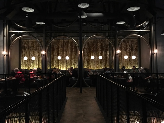 the restaurant has high ceilings and an elegant steampunk design - A Review of The Toothsome Chocolate Emporium at Universal Orlando