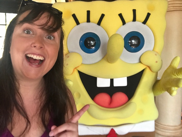 cailin with spongebob squarepants at a Universal Orlando character breakfast - Universal Orlando's Best Theme Park Foods