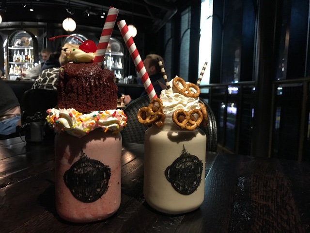 red velvet and salted dulce de leche milk shakes at The Toothsome Chocolate Emporium and Savory Feast Kitchen - The Ultimate Bucket List for Universal Orlando