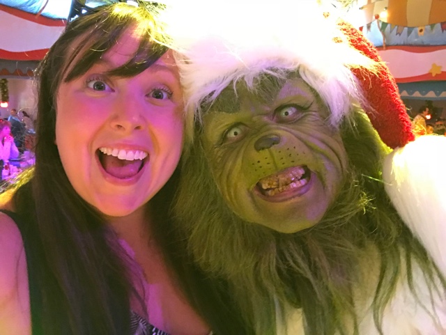 Cailin having grinchmas breakast with the grinch and whos from whoville in circus mcgurkus - Best Tips for Celebrating the Holidays at Universal Orlando