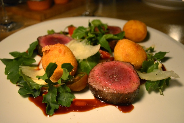 Lanai Venison - Roasted Tomato Polenta Cake, Arugula, Shaved Parmesan, Sherry Veal reduction axis deer at restaurant one forty - Four Seasons Resort Lanai in Hawaii Review