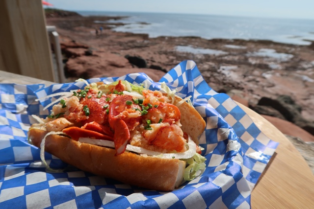 warm buttered lobster roll from the point prim chowder house and oyster bar - Where to Eat the Best Lobster Rolls in Prince Edward Island?